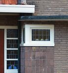 Aparte roedenverdeling in de bovenraampjes.
<br/>
Richard Keijzer, 2014-12-11